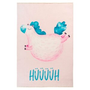 Teppich mit rosa Cartoon-Einhorn und blauen Mähnenflügeln auf hellem Hintergrund.