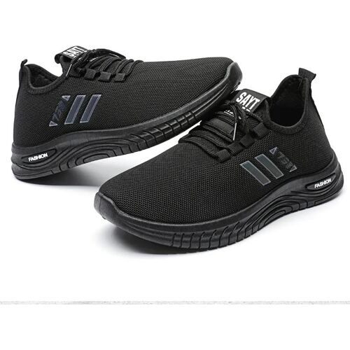 Zwei schwarze Sportschuhe mit Gummisohlen und stilvollen Streifen Zwei schwarze Sportschuhe mit Gummisohlen und stilvollen Streifen